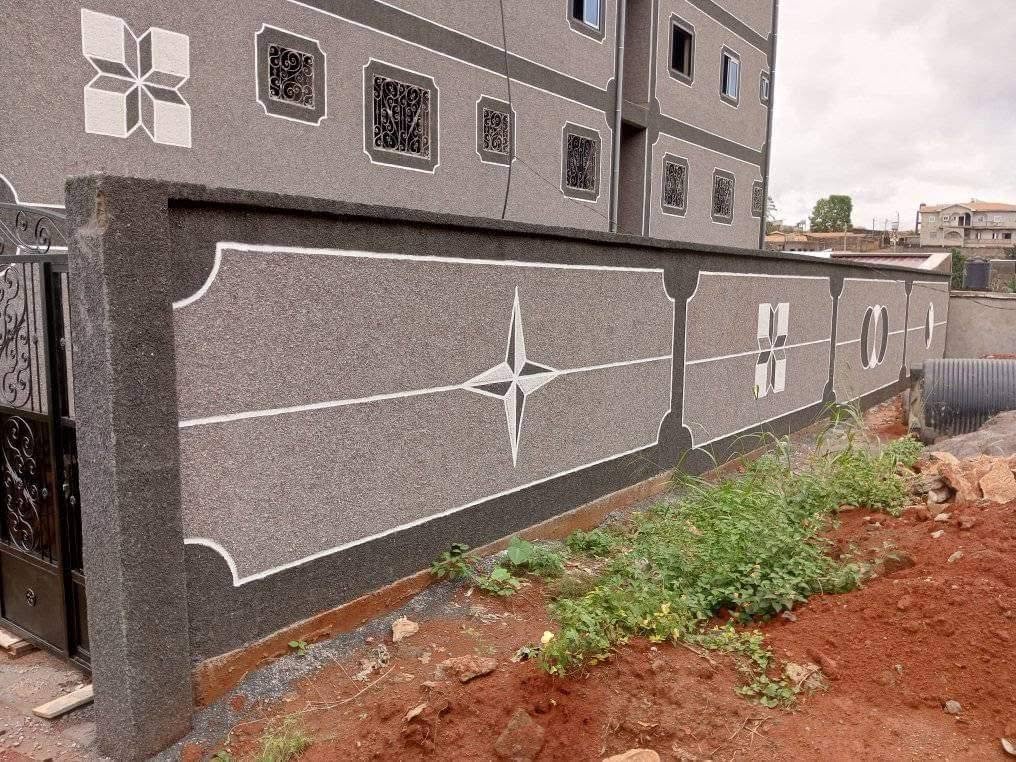 Decorated compound fence wall with modern granite stone finish in Cameroon